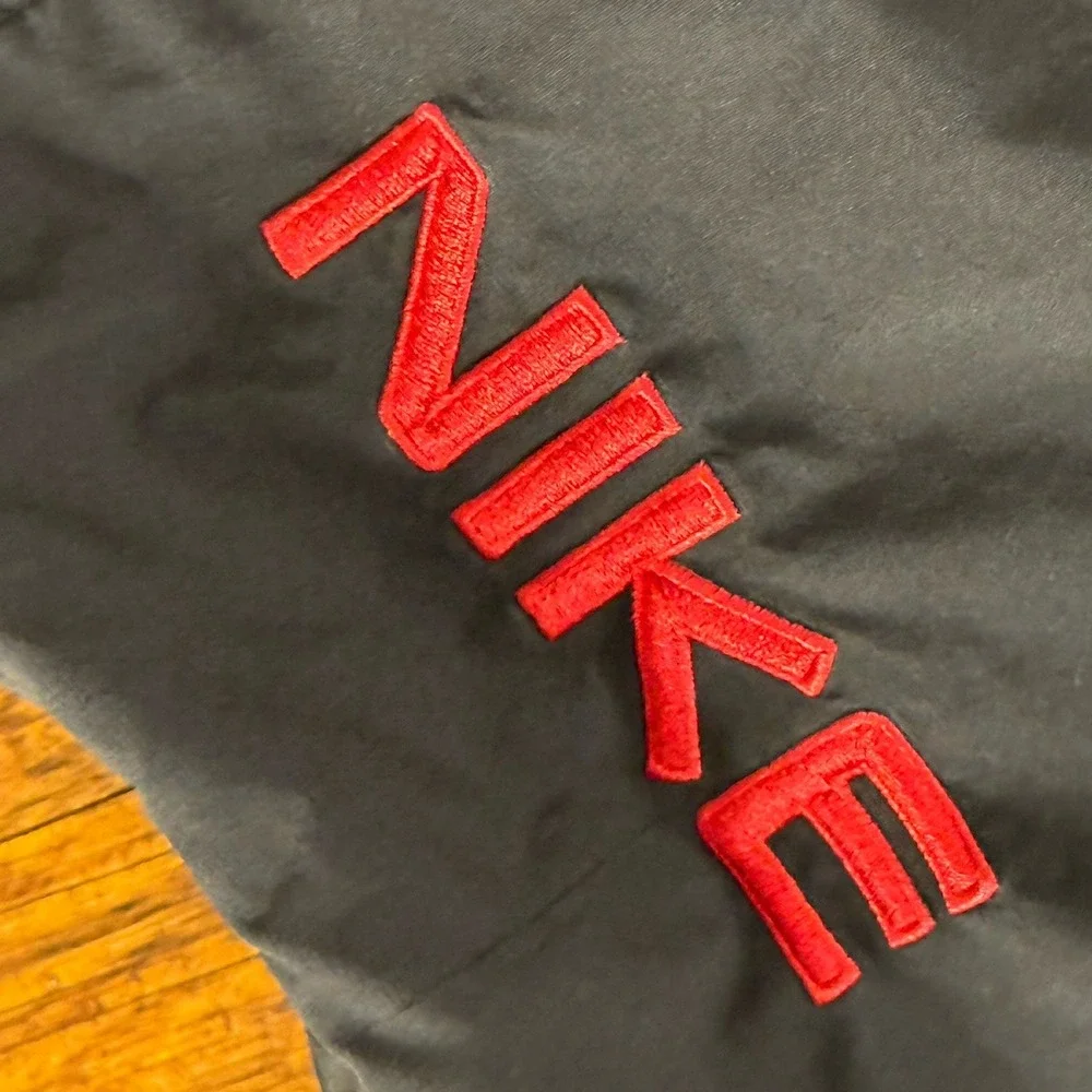 Vintage Y2K-era Nike nylon track pants 2000's Size M Medium Black/red
